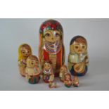 Family of ten Russian nesting dolls. Largest h24cm