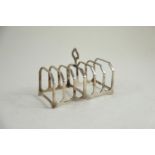 Silver toast rack, maker C & S LTD, Birmingham 1922, 11cm wide, 82 grams