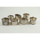 Seven silver napkin rings, various makers & dates, gross weight 196 grams