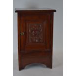 Mahogany pot cupboard with carved panel h62cm W40cm