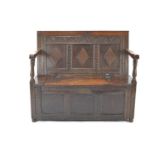 Carved oak storage bench. L105cm x D54cm x H94xm