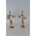 Pair of Volkstedt porcelain figural candelabra, late 19th century, crossed forks to base, 51.5cm hig