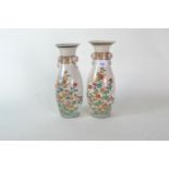 Matched pair of Japanese vases, 19th century, 27.8cm & 28.5cm respectively