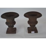 Pair of cast metal urns with egg & dart detail H29cm