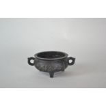 Chinese bronze censer, with lugs handles & tripod base, set four character marks to base, 7cm high