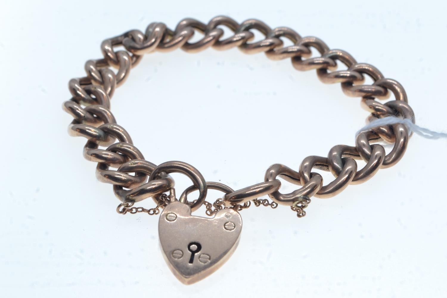 9ct rose gold bracelet with heart-shaped padlock clasp, 16.97 grams 