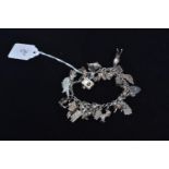 Heavy silver charm bracelet, gross weight 50.4g