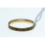 George III enamel memorial band ring, inscribed 'Thos Sargent DI 27 NOVR 1774&nbsp;&AElig; 66', size