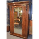 Early c20 compactum wardrobe with mirror front door. w133cm h204cm d67cm