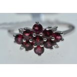 10ct white gold &amp; red stone cluster ring, size O, 2.42 grams