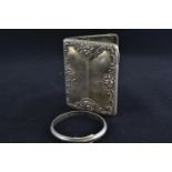 Silver cased purse, hallmarks rubbed, inscribed 'Hannah' to front, 10 x 7.5cm, together with a silve