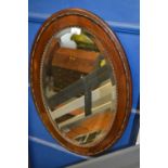 Oak framed oval mirror ,early c20. w53cm h80cm