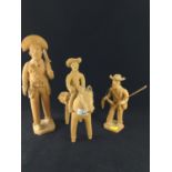 Three terracotta figures, rider on horseback signed Severino Vitalino and two others stamped to base