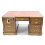 Red leather topped small Desk style coffee table with 4 drawers and two cupboards with brass handles