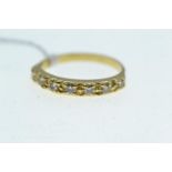 Yellow metal &amp; seven stone diamond half hoop ring, tests positive for 18ct gold, size Q, 3 grams
