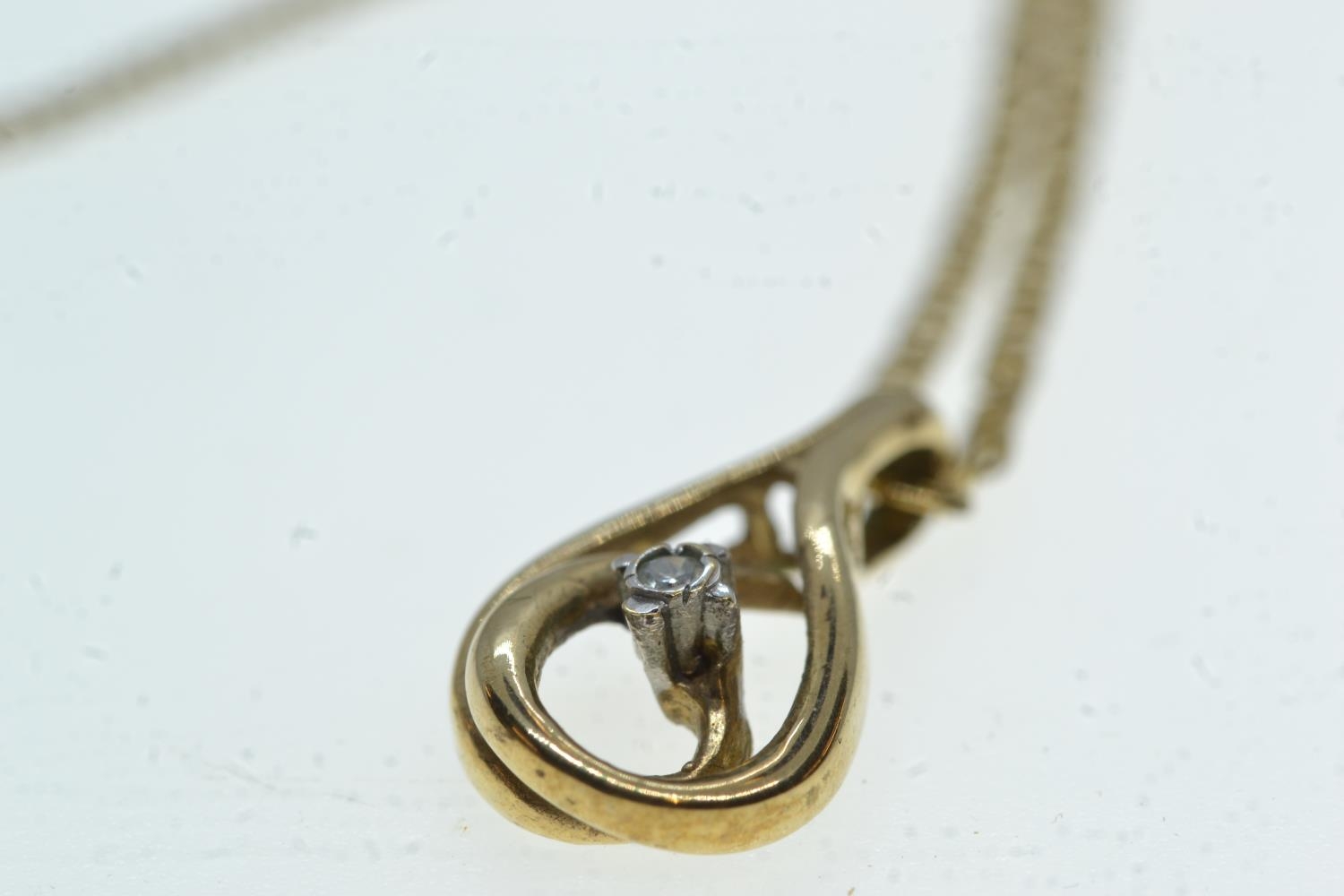 9ct gold & diamond pendant, with a 9ct gold chain, pendant length 17mm, chain circumference 455mm, g - Image 3 of 3