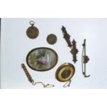 9ct gold brooch, two yellow metal lockets testing positive for 9ct gold (AF) &amp; five other gilt m