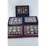 Five Royal Mint UK proof coin sets in presentation boxes, including 2001 Glimpses of the Victorian E