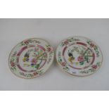 Two Chinese export 18th century famille rose plates, each decorated with a cockerel with two chicks