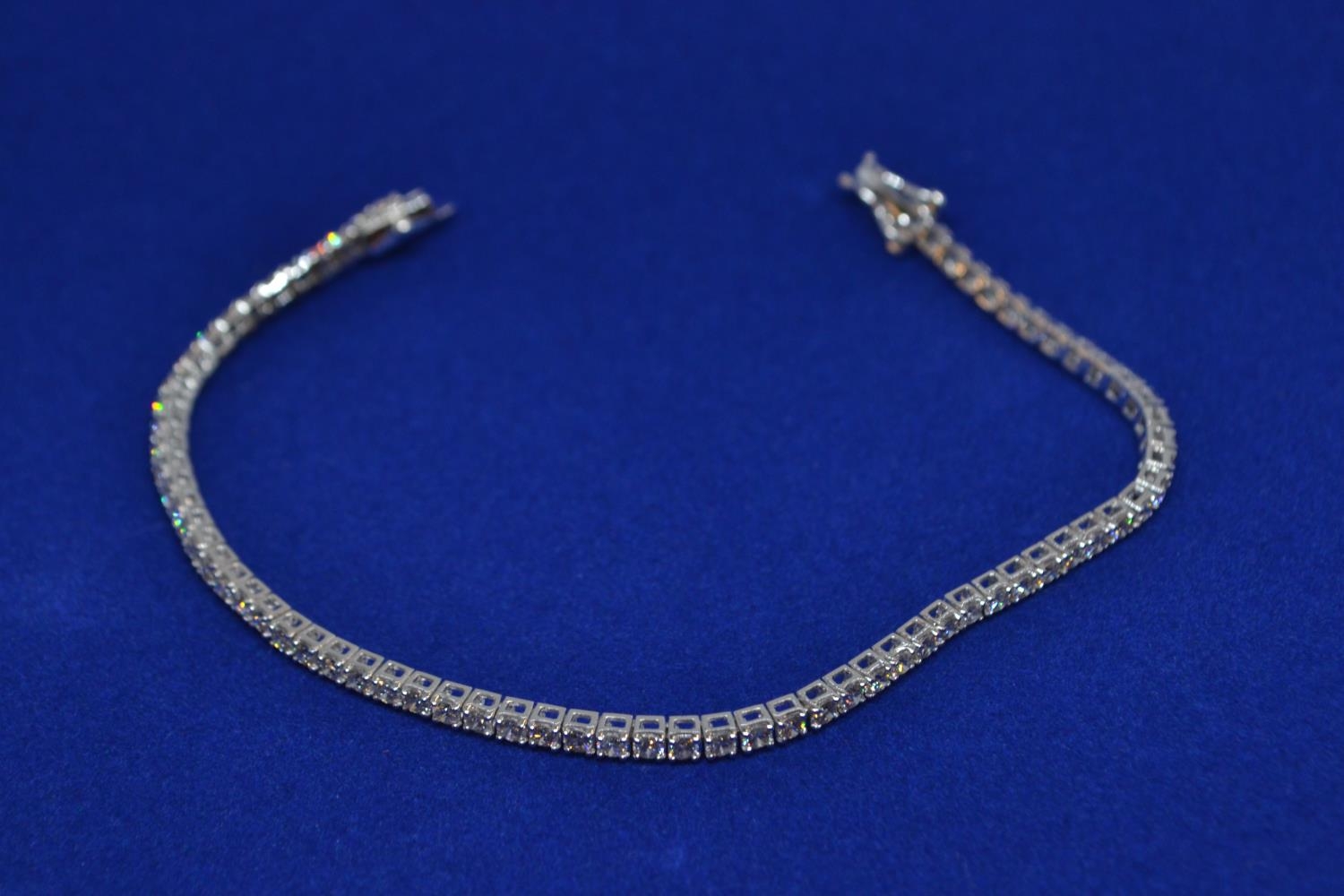 18ct white gold & 3ct diamond line bracelet, circumference 175mm, 8.13 grams 