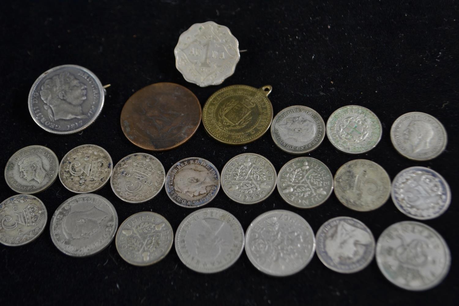 Fourteen various pre-1920 & pre-1947 threepences, a mounted Georgian coin & other coins 