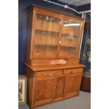 Pitch Pine Dresser with single pane glass doors, Splits into two pieces. W144cm D54cm H204cm.