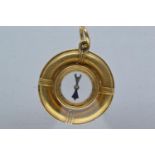 Yellow metal compass charm pendant, tests positive for 9ct gold, 25mm diameter, gross weight 6.38 gr