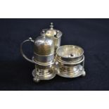 Silver cruet set, maker H.W &amp; Co Ld, London 1912, 15 &amp; 16, comprising trefoil stand with pep