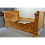 Art Deco solid Walnut 4ft double bed on casters.