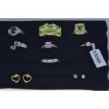 Seven 925 silver rings, including some gem set, various sizes, together with two pairs of silver ear