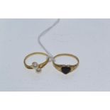 Two 9ct gold &amp; gem-set rings, one set with two cultured pearls &amp; the other with a heart-shap