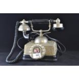 Vintage style rotary phone with modern fittings.