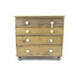 2 over 3 stipped pine chest of drawers. W104cm H97cm D54cm