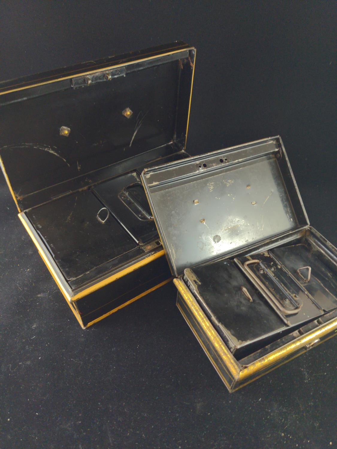 Two cash tins with lift out compartments (both have keys) 