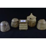 Charmouth Pottery collection of five honey pots
