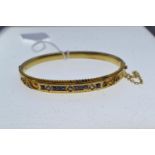 15ct gold, diamond &amp; sapphire hinged bangle, inner width approximately 57mm, 11.31 grams