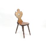 C19th German pitch pine inscribed hall chair