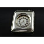 Silver fronted watch stand, maker DNH &amp; S, Birmingham 1915, 11.5cm high, enclosing an oversize o