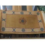 Chinese rug with central medallion and border in gold tone, 95cm x 160cm approx.