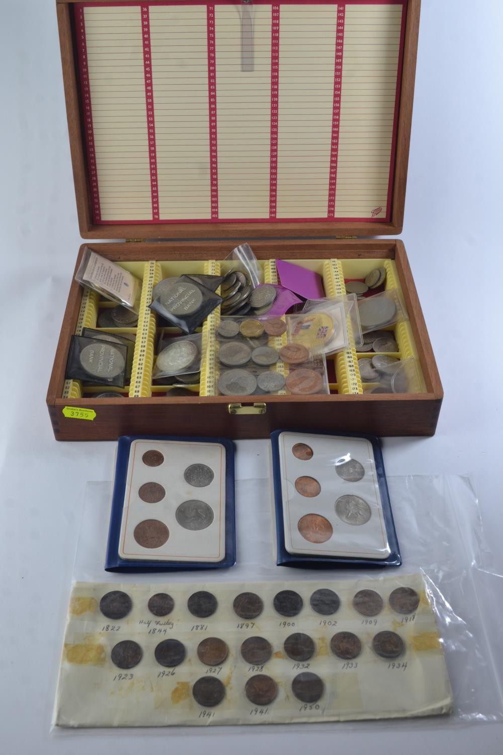 Slide box containing mostly British coins, including half crowns and commemorative 