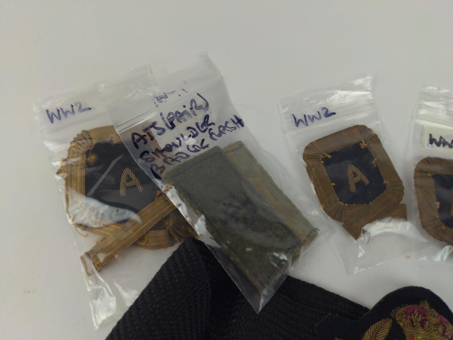 Eight WWII cloth badges, including Royal Navy officer's cap badge, two fleet air arm observer wing b - Image 2 of 2