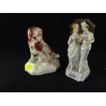 Staffordshire model of a spaniel, circa 1980, height 12.2cm, together with a continental figural gro