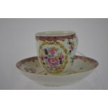 Worcester cup &amp; saucer, 18th century, decorted with polychrome flowers &amp; gilt borders, sauce