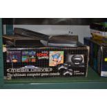 Boxed Sega Megadrive with 4 games including Sonic, Sonic 2, Desert Strike and Mega Games 1,&nbsp;