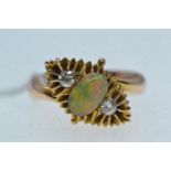 Opal &amp; diamond ring, mounted in yellow metal tested positive for 14ct gold, size I, 3.79 grams