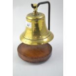 Brass table bell on stand.&nbsp;