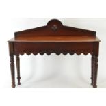 Mahogany hall table, with front apron and &amp; bullseye pediment. W122cm d41cm h101cm