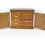 Oak cased clerks/filing cabinet by Shannon File co. ltd. Rochester with nine mahogany fronted intern