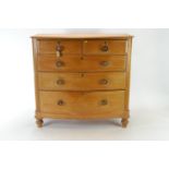 Pine 2 over 3 bow fronted chest of drawers, with brass escutcheons and MOP detailed turned knobs. Ra