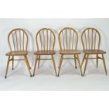 4 Ercol 400 Windsor kitchen chairs. Natural finish. Vintage blue label. W46cm D44cm H86cm